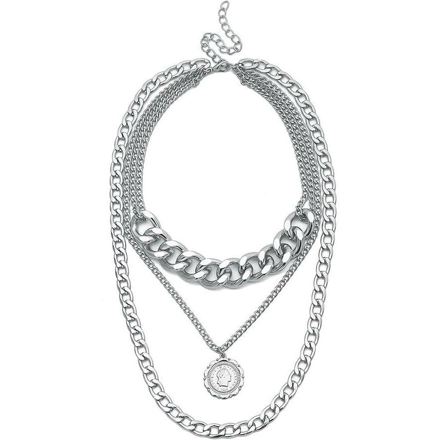 Statement silver chain link layered necklace with medallion charm. 