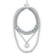 Statement silver chain link layered necklace with medallion charm. 