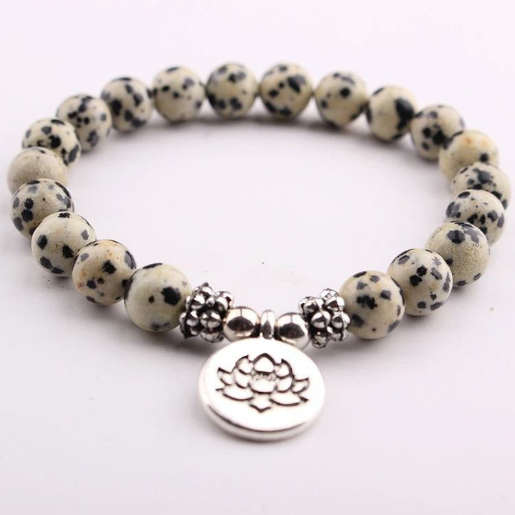 Mala Bead Bracelet is simplicity at its finest for a lady or guy.  The lotus / ohm charm connects our Solar Plexus - White Dalmation