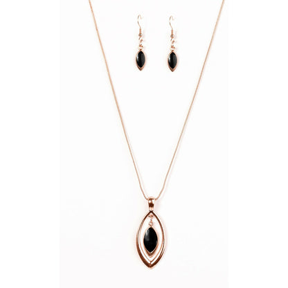 shiny black pendant swings from the top of a shiny copper silhouette, creating a refined pendant below the collar.