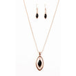 shiny black pendant swings from the top of a shiny copper silhouette, creating a refined pendant below the collar.