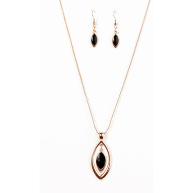 shiny black pendant swings from the top of a shiny copper silhouette, creating a refined pendant below the collar.