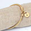Stainless steel gold bangle bracelet with heart locket 